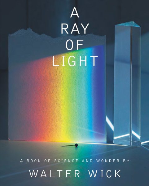 Cover art for A ray of light : a book of science and wonder / written and photographed by Walter Wick.