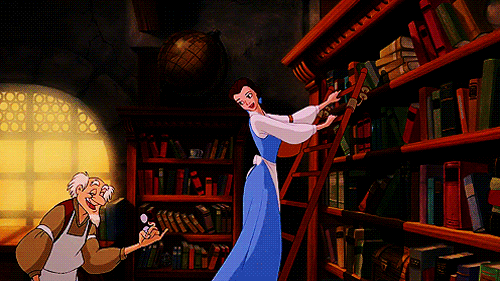 An animated gif of Disney's Beauty and the Beast - Belle riding on the rolling ladder in the bookshop